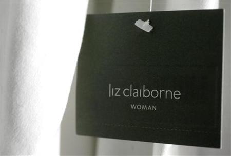 A Liz Claiborne hang tag is shown on a woman's blouse in Burbank ...